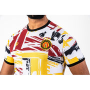 ESPÉRANCE SPORTIVE DE TUNIS POLYESTER PRE-MATCH JERSEY WITH ABSTRACT RED, YELLOW, AND BLACK 1919 ORNAMENTS